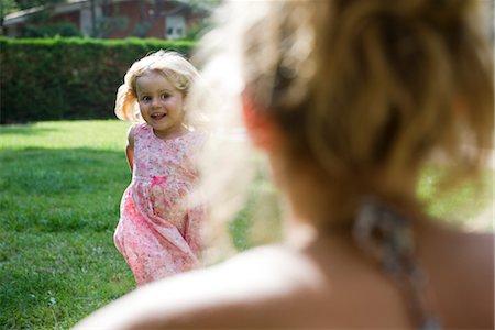 Little girl running toward mother Stock Photo - Premium Royalty-Free, Code: 632-05554173