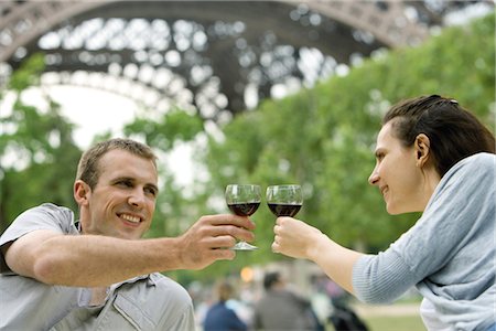 picnicking - Couple clinking wine glasses outdoors Stock Photo - Premium Royalty-Free, Code: 632-05553868