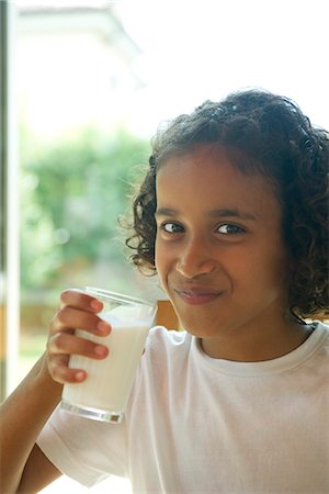 Girl drinking glass of milk, portrait Stock Photo - Premium Royalty-Free, Code: 632-05604369