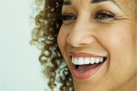 Woman smiling, close-up Stock Photo - Premium Royalty-Free, Code: 632-05603768