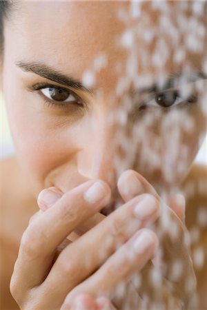 simsearch:632-05760692,k - Woman's face behind running water Stock Photo - Premium Royalty-Free, Code: 632-05759532