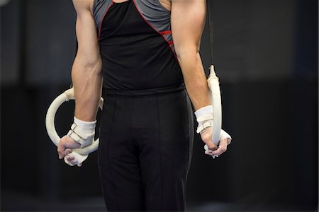 Male gymnast on the rings, cropped Stock Photo - Premium Royalty-Free, Code: 632-05759547