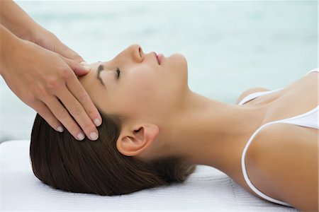 shiatsu - Young woman receiving face massage, side view Stock Photo - Premium Royalty-Free, Code: 632-05816080