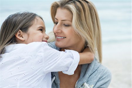 Mother and daughter looking at each other, portrait Stock Photo - Premium Royalty-Free, Code: 632-05816348