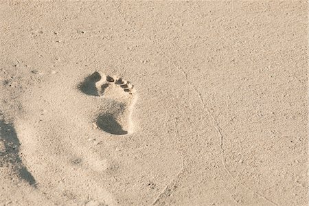 footprints sand - Footprint in sand Stock Photo - Premium Royalty-Free, Code: 632-05816763