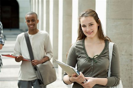University students on campus, focus on woman in foreground Stock Photo - Premium Royalty-Free, Code: 632-05816857