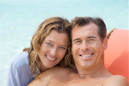 simsearch:632-05845211,k - Couple relaxing at beach, portrait Stock Photo - Premium Royalty-Free, Code: 632-05844974