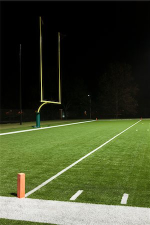 football not soccer - Goal post on empty football field Stock Photo - Premium Royalty-Free, Code: 632-05991536