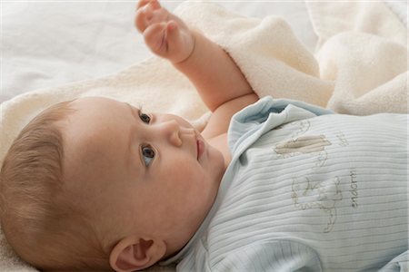 simsearch:632-03027302,k - Baby boy lying on back, looking up Stock Photo - Premium Royalty-Free, Code: 632-05991808