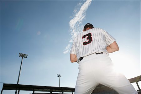 Baseball player, rear view Stock Photo - Premium Royalty-Free, Code: 632-05991894