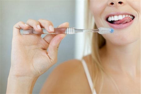 dental care woman - Woman brushing teeth, cropped Stock Photo - Premium Royalty-Free, Code: 632-05991911