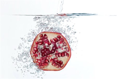 pomegranate - Pomegranate half submerged in water Stock Photo - Premium Royalty-Free, Code: 632-06029859