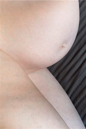 pregnancy nude - Nude pregnant woman, cropped Stock Photo - Premium Royalty-Free, Code: 632-06317117