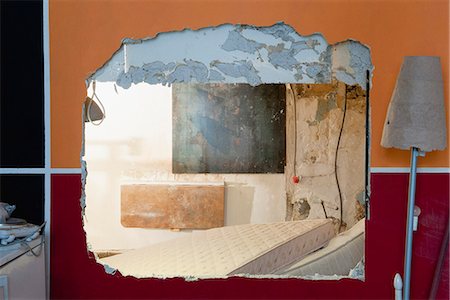 deteriorating building - Large hole in wall at demolition site Stock Photo - Premium Royalty-Free, Code: 632-06317499