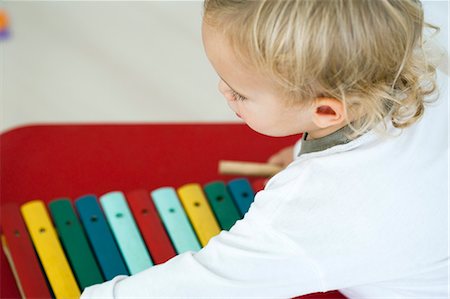 Baby boy with toy xylophone, high angle view Stock Photo - Premium Royalty-Free, Code: 632-06354046