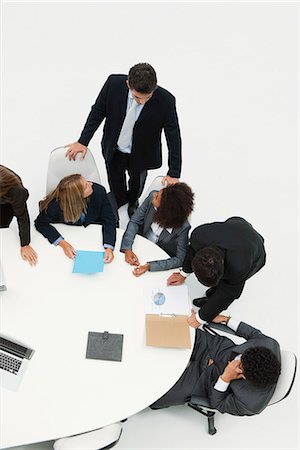 Colleagues collaborating on project Stock Photo - Premium Royalty-Free, Code: 632-06354343