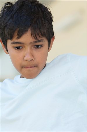 simsearch:614-06043612,k - Boy looking down Stock Photo - Premium Royalty-Free, Code: 632-06404397