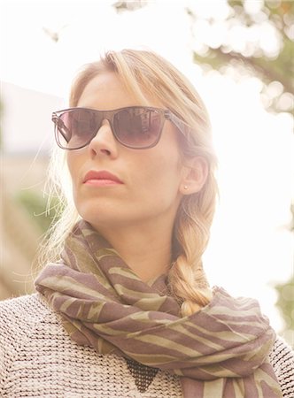 simsearch:632-05760692,k - Woman wearing sunglasses and scarf, portrait Stock Photo - Premium Royalty-Free, Code: 632-07539941