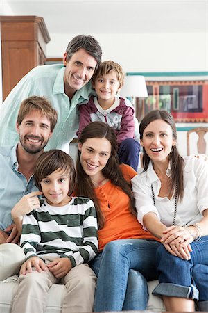 simsearch:632-05816381,k - Family together in living room, portrait Stock Photo - Premium Royalty-Free, Code: 632-07849463
