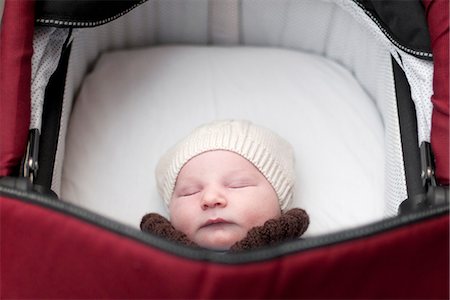 simsearch:614-07031850,k - Baby sleeping in pram Stock Photo - Premium Royalty-Free, Code: 632-07849503