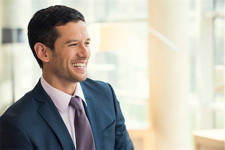 simsearch:632-05604036,k - Businessman smiling cheerfully Stock Photo - Premium Royalty-Free, Code: 632-08001670