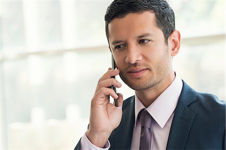 simsearch:632-05400935,k - Businessman using cell phone Stock Photo - Premium Royalty-Free, Code: 632-08001671