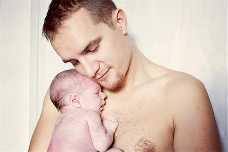 simsearch:632-08001820,k - Father holding newborn baby Stock Photo - Premium Royalty-Free, Code: 632-08001819