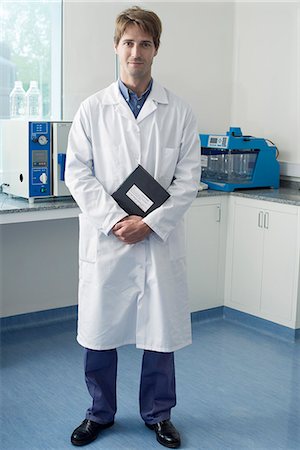 Scientist standing in laboratory, portrait Stock Photo - Premium Royalty-Free, Code: 632-08001851