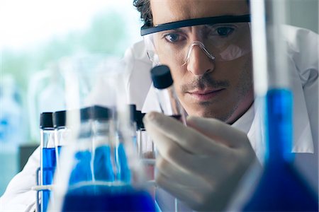 scientist - Lab technician conducting experiment in laboratory Stock Photo - Premium Royalty-Free, Code: 632-08130284