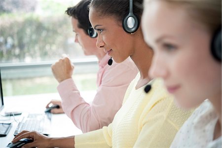 switchboard operator - Telemarketers at work in call center Stock Photo - Premium Royalty-Free, Code: 632-08227570