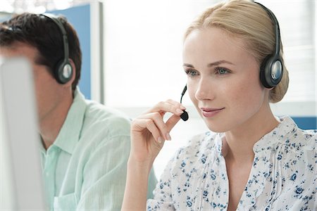 Woman working in call center Stock Photo - Premium Royalty-Free, Code: 632-08227751