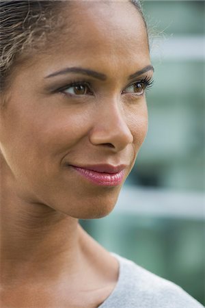 simsearch:632-05760692,k - Woman smiling and looking away, portrait Stock Photo - Premium Royalty-Free, Code: 632-08331390