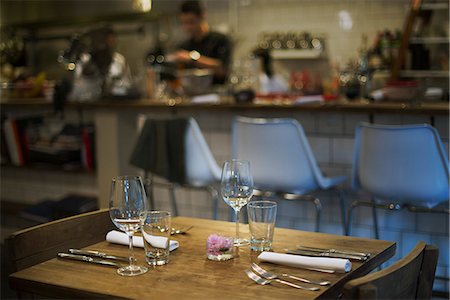 people restaurant lights interior - Restaurant table ready for customer Stock Photo - Premium Royalty-Free, Code: 632-08331702