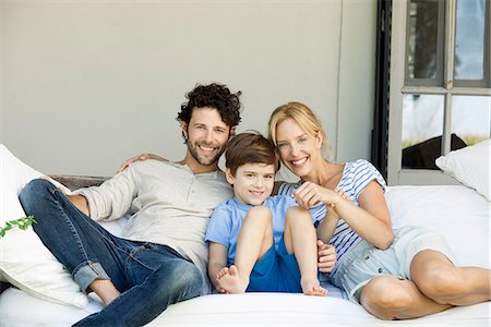 photo of person sitting on porch - Family with one child relaxing together outdoors Stock Photo - Premium Royalty-Free, Code: 632-08698321