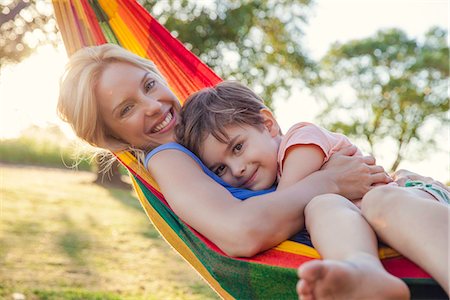 simsearch:632-05816381,k - Mother and son relaxing in hammock together Stock Photo - Premium Royalty-Free, Code: 632-08698457