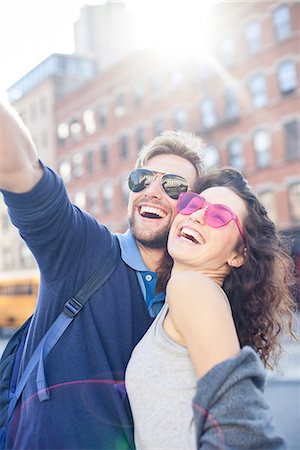 simsearch:632-07674444,k - Couple posing for a selfie Stock Photo - Premium Royalty-Free, Code: 632-08886460