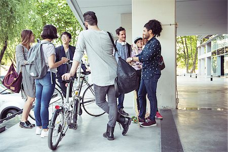 Group of coworkers chatting after work Stock Photo - Premium Royalty-Free, Code: 632-08886685