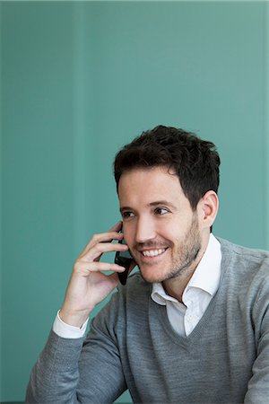 simsearch:632-05400935,k - Businessman talking on cell phone Stock Photo - Premium Royalty-Free, Code: 632-08886743