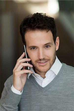 simsearch:632-05400935,k - Businessman talking on cell phone Stock Photo - Premium Royalty-Free, Code: 632-08887019