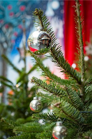 simsearch:632-06118429,k - Ornaments hanging on christmas tree Stock Photo - Premium Royalty-Free, Code: 632-08887124