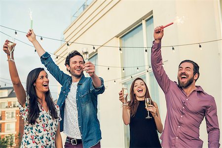 simsearch:6113-06909171,k - Friends celebrating with champagne outdoors Stock Photo - Premium Royalty-Free, Code: 632-08993464