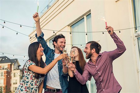 simsearch:6113-06909171,k - Friends celebrating with champagne outdoors Stock Photo - Premium Royalty-Free, Code: 632-08993465