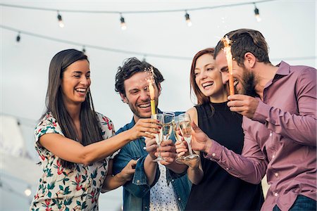 simsearch:6113-06909171,k - Friends drinking champagne together outdoors Stock Photo - Premium Royalty-Free, Code: 632-08993467
