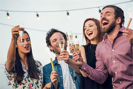 simsearch:6113-06909171,k - Friends drinking champagne together outdoors Stock Photo - Premium Royalty-Free, Code: 632-08993469