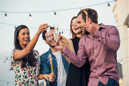 simsearch:6113-06909171,k - Friends drinking champagne together outdoors Stock Photo - Premium Royalty-Free, Code: 632-08993470