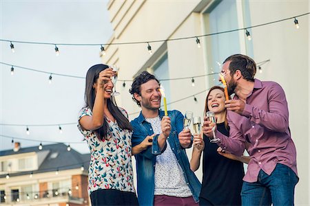 simsearch:6113-06909171,k - Friends drinking champagne together outdoors Stock Photo - Premium Royalty-Free, Code: 632-08993473