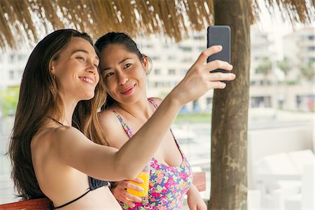 simsearch:632-07674444,k - Women posing together for selfie Stock Photo - Premium Royalty-Free, Code: 632-09021595