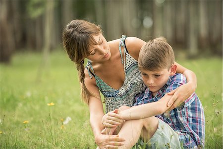 Mother comforting son outdoors Stock Photo - Premium Royalty-Free, Code: 632-09021614