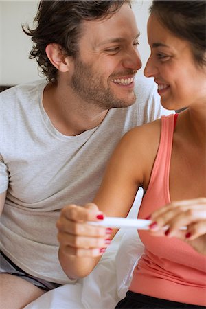 pregnancy - Couple pleased with pregnancy test results Stock Photo - Premium Royalty-Free, Code: 632-09039800