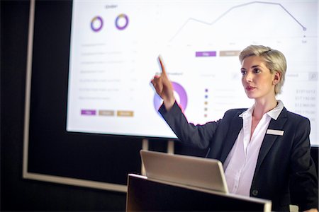 Woman giving presentation Stock Photo - Premium Royalty-Free, Code: 632-09140190